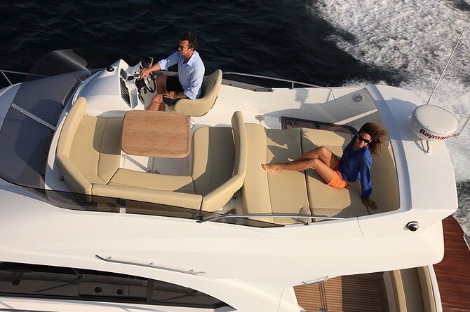 2 Hour Private Sunset Cruise on Luxury Motor Boat with Drinks - Boarding at Puerto Colón Marina: champagne, snacks, and a calm start