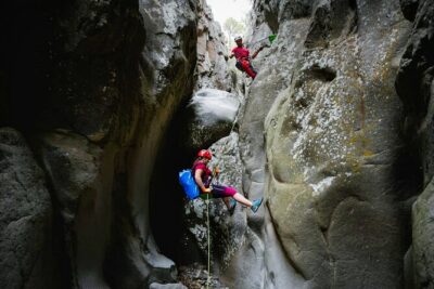 Canyoning in Tenerife South - Going down the canyon: narrow basalt walls and varied rappelling