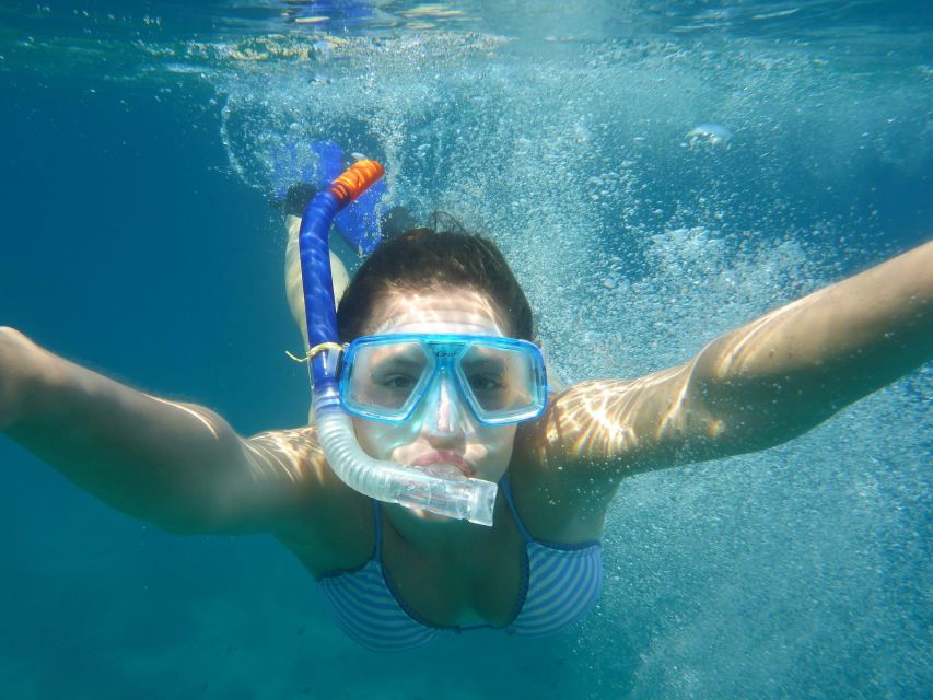 Costa Adeje: Private Catamaran Tour 22 Persons Max - The anchor stop: where sunbathing turns into swimming time