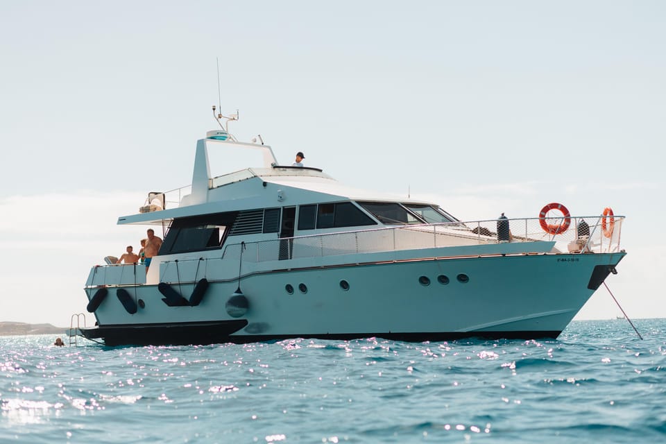 Costa Adeje: Private Yacht Trip with Watersports and Slides - Gulliver Fun Yacht: a 20-meter family playground off Puerto Colón