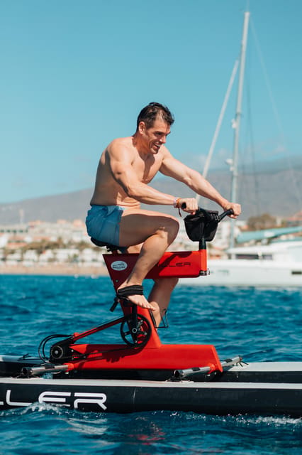 Costa Adeje: Private Yacht Trip with Watersports and Slides - Los Cristianos break: photos, orientation, and a bit of coastal sightseeing