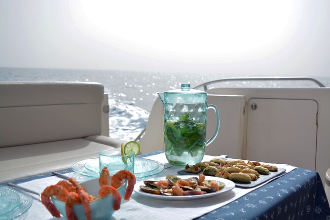 Private Boat Tour on Royal Ocean Yacht, Tenerife - Los Cristianos bay hour: snorkeling, unlimited drinks, and tapas lunch