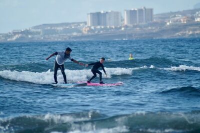 Surfing lessons in Las Americas - The 2-Hour Flow: Theory, Safety Rules, Then Board Time