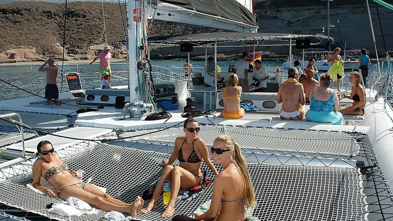 Tenerife: Catamaran Cruise with an Open Bar - Getting Aboard the Freebird: Crew, Comfort, and the Sun Deck