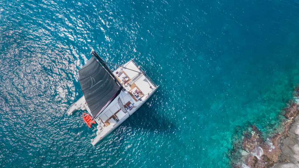 Tenerife: Catamaran Cruise with Brunch and Unlimited Drinks - The coast-hugging photo stops: Playa de las Américas, Los Cristianos, and Palm-Mar
