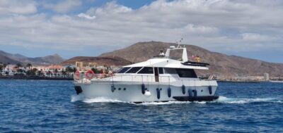 Tenerife: Fun Yacht Trip with Water Activities and Toys - Puerto Colón start: safety briefing, guided intro, then cruise vibes